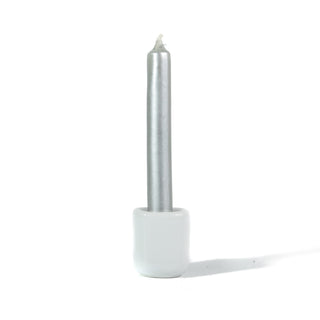 Small silver metallic chime spellwork candle in a white ceramic chime holder against a white background.