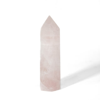 One light pink rose quartz generator against white background.