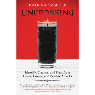 Cover of Uncrossing by Katrina Rasbold is red and shows a lit black glass ritual jar candle. 