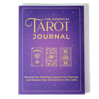 Cover of The Essential Tarot Journal to record your readings. Cover is purple with yellow text and has three stylized tarot cards on the front.