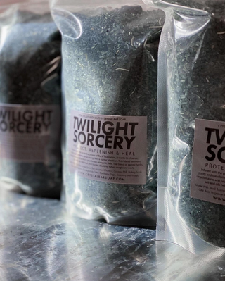 Twilight Sorcery bath salt for energetic protection. Salt is black and infused with black tourmaline and white sage.
