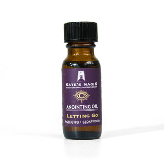 Letting Go anointing oil by Kates Magik in a .5 ounce amber glass bottle.