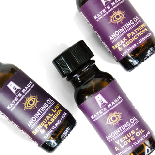Three anointing oils are featured- small amber bottles with purple labels. 
