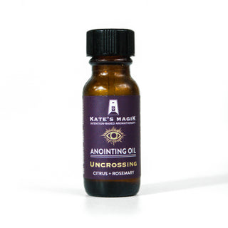Uncrossing anointing oil by Kates Magik in .5 ounce amber glass bottle