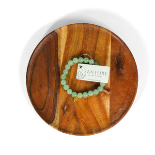 Green Aventurine beaded gemstone bracelet for luck and heart healing. Stones are light green. 