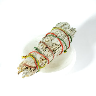 Sustainably cultivated white sage bundle, wrapped in string for smoke cleansing