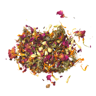 Loose Moon Magick tea with dried roses, jasmine, raspberry leaf, calendula, lavender, rosehips and other dried herbs.