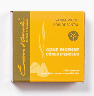 Box of Sandalwood Maroma Cone Incense. Box is dark yellow  with drawing of lit cone incense.