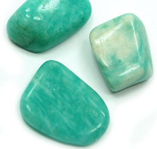 Close up of three Amazonite tumbled pocket stones showing shades of aqua and teal.