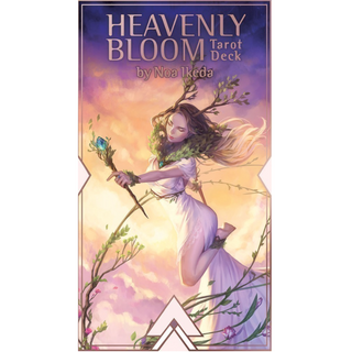 Box of the Heavenly Bloom Tarot Deck. Cover shows a woman flying holding a wand with a blue crystal. She is wearing a white dress and has horns with leaves. The background is dusk.