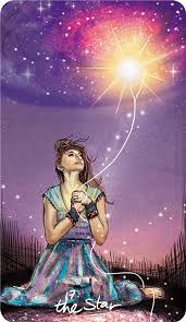 The Star card from the Light Seer's Tarot shows a woman in a purple and pink night sky